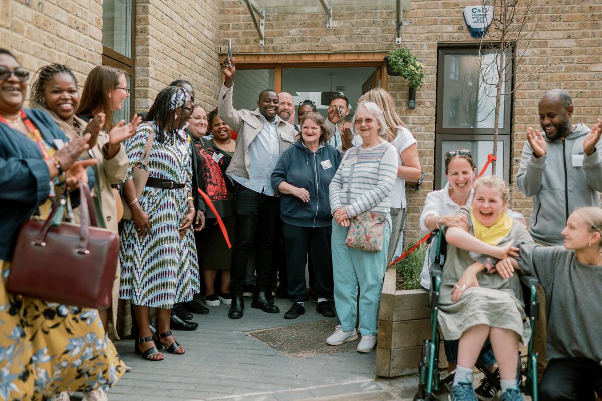 Cllr Anthony Okereke cutting the ribbon to officially open the Royal Hill Independent Living Service