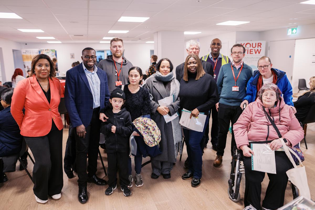 A group of councillors, council staff and residents at the welcome event for new council tenants at Greenwich Millennium Village.