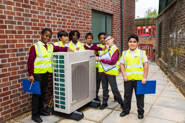 Group of children with green technology