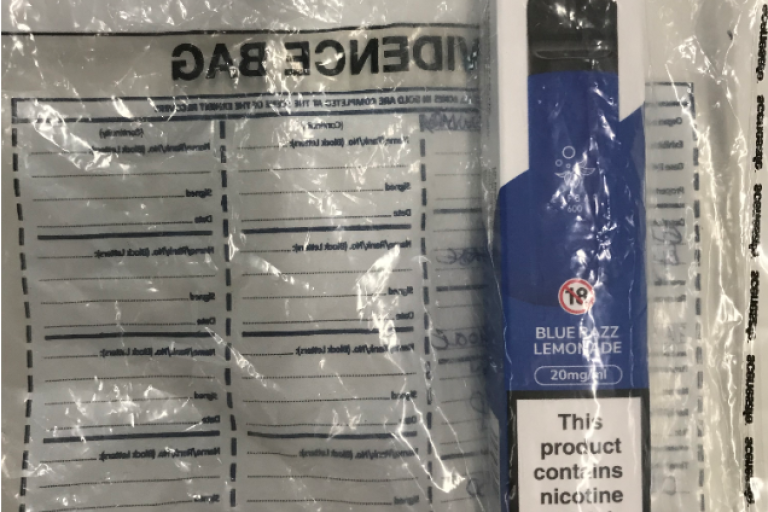 Blue disposable vape inside an evidence bag