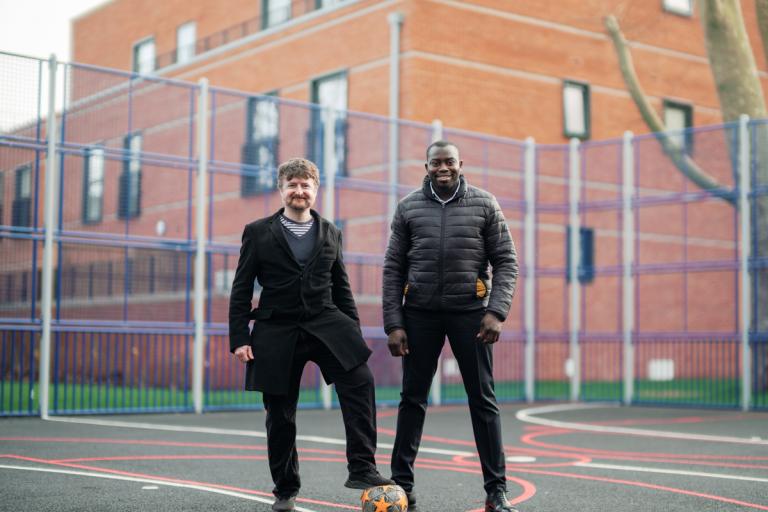 Cllr Anthony Okereke and Cllr Aidan Smith in the new ball court at Bliss Crescent.