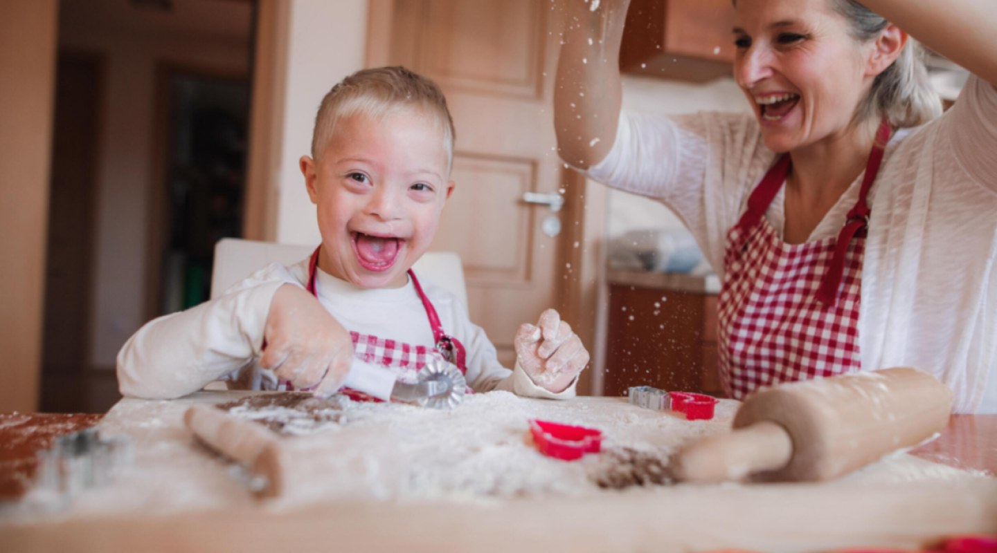 Child and adult baking.